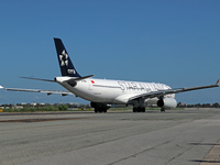 An Airbus A330-343 from Air China, in Star Alliance livery, is on the runway ready to take off from Barcelona airport in Barcelona, Spain, o...