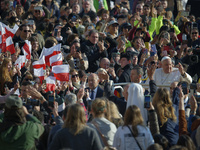 Pope Francis waves to pilgrims after attending the weekly general audience at St. Peter's Square in The Vatican on November 6, 2024. (