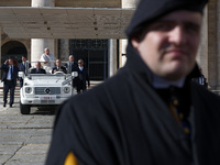 Pope Francis leaves St. Peter's Square in the Popemobile at the end of his general weekly audience in Vatican City, on November 6, 2024. (