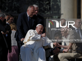 Pope Francis leaves at the end of the weekly general audience in St. Peter's Square, at the Vatican, on November 6, 2024 (