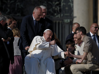 Pope Francis leaves at the end of the weekly general audience in St. Peter's Square, at the Vatican, on November 6, 2024 (