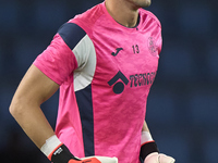 David Soria of Getafe CF warms up before the La Liga EA Sports match between RC Celta de Vigo and Getafe CF at Estadio Abanca Balaidos in Vi...