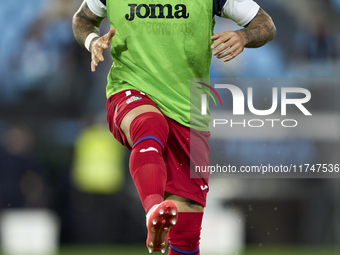 Carles Perez of Getafe CF warms up before the La Liga EA Sports match between RC Celta de Vigo and Getafe CF at Estadio Abanca Balaidos in V...