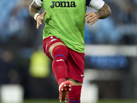 Carles Perez of Getafe CF warms up before the La Liga EA Sports match between RC Celta de Vigo and Getafe CF at Estadio Abanca Balaidos in V...