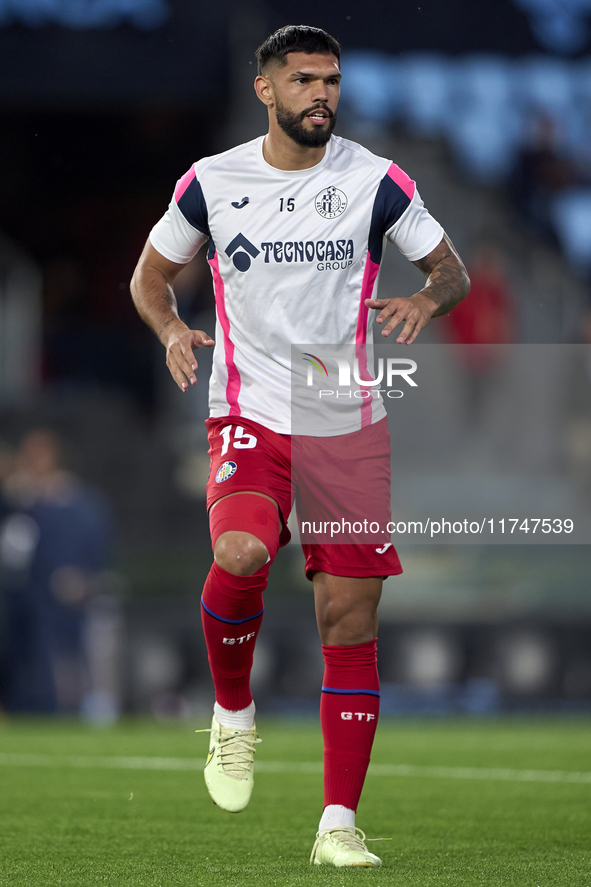 Omar Alderete of Getafe CF warms up before the La Liga EA Sports match between RC Celta de Vigo and Getafe CF at Estadio Abanca Balaidos in...