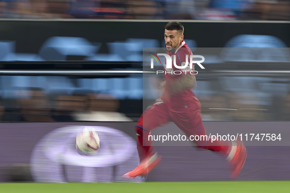 Carles Perez of Getafe CF is in action during the La Liga EA Sports match between RC Celta de Vigo and Getafe CF at Estadio Abanca Balaidos...