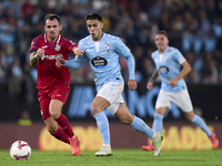 Alex Sola of Getafe CF competes for the ball with Hugo Sotelo of RC Celta de Vigo during the La Liga EA Sports match between RC Celta de Vig...