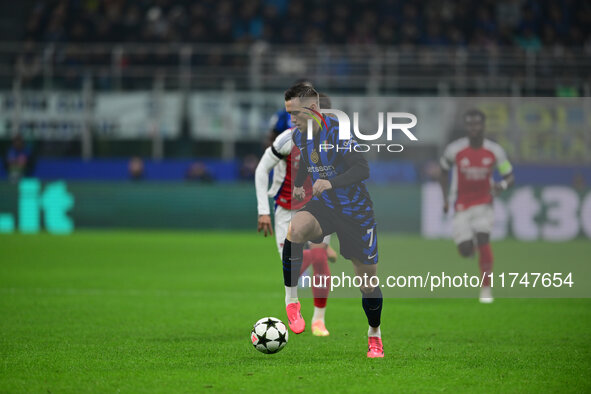 Piotr Zielinski of Inter Milan is in action during the Champions League match between Inter Milan and Arsenal at San Siro Stadium in Bergamo...