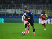 Piotr Zielinski of Inter Milan is in action during the Champions League match between Inter Milan and Arsenal at San Siro Stadium in Bergamo...