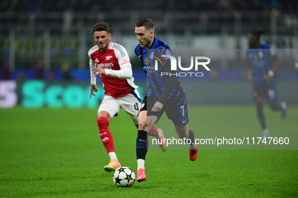 Piotr Zielinski of Inter Milan is in action during the Champions League match between Inter Milan and Arsenal at San Siro Stadium in Bergamo...