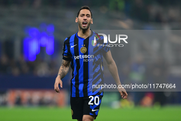 Hakan Calhanoglu of Inter Milan looks on during the Champions League match between Inter Milan and Arsenal at San Siro Stadium in Bergamo, I...