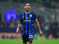 Hakan Calhanoglu of Inter Milan looks on during the Champions League match between Inter Milan and Arsenal at San Siro Stadium in Bergamo, I...