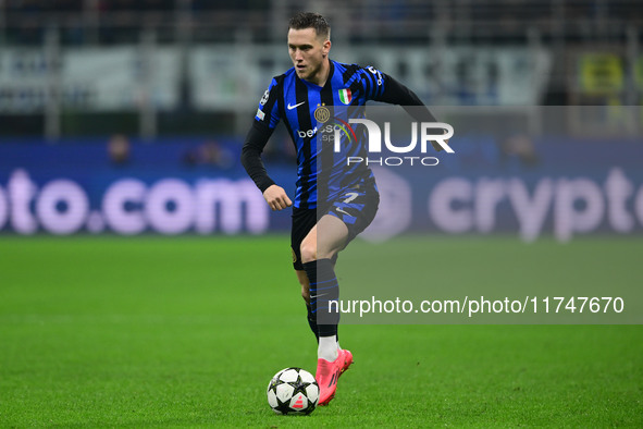 Piotr Zielinski of Inter Milan is in action during the Champions League match between Inter Milan and Arsenal at San Siro Stadium in Bergamo...