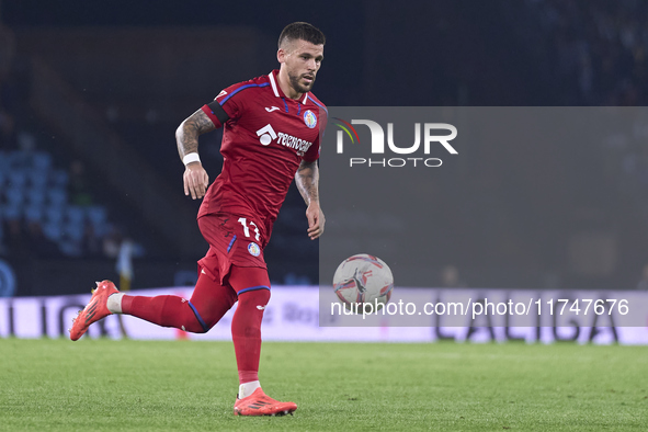 Carles Perez of Getafe CF is in action during the La Liga EA Sports match between RC Celta de Vigo and Getafe CF at Estadio Abanca Balaidos...