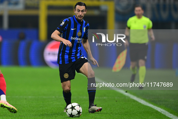 Matteo Darmian of Inter Milan is in action during the Champions League match between Inter Milan and Arsenal at San Siro Stadium in Bergamo,...