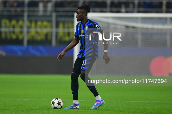 Yann Aurel Bisseck of Inter Milan is in action during the Champions League match between Inter Milan and Arsenal at San Siro Stadium in Berg...