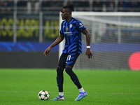 Yann Aurel Bisseck of Inter Milan is in action during the Champions League match between Inter Milan and Arsenal at San Siro Stadium in Berg...