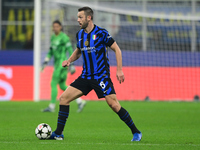 Stefan de Vrij of Inter Milan plays during the Champions League match between Inter Milan and Arsenal at San Siro Stadium in Bergamo, Italy,...