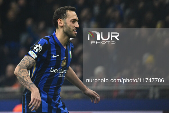 Hakan Calhanoglu of F.C. Inter celebrates after scoring the goal of 1-0 during the UEFA Champions League 2024/25 League Phase MD4 match betw...