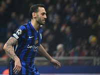 Hakan Calhanoglu of F.C. Inter celebrates after scoring the goal of 1-0 during the UEFA Champions League 2024/25 League Phase MD4 match betw...