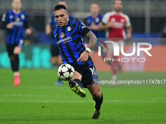 Lautaro Martinez of Inter Milan is in action during the Champions League match between Inter Milan and Arsenal at San Siro Stadium in Bergam...