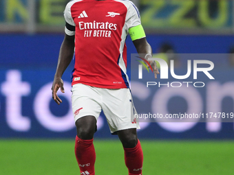 Bukayo Saka of Arsenal is in action during the Champions League match between Inter Milan and Arsenal at San Siro Stadium in Bergamo, Italy,...