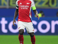 Bukayo Saka of Arsenal is in action during the Champions League match between Inter Milan and Arsenal at San Siro Stadium in Bergamo, Italy,...