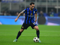 Hakan Calhanoglu of Inter Milan is in action during the Champions League match between Inter Milan and Arsenal at San Siro Stadium in Bergam...