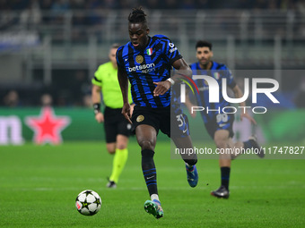 Yann Aurel Bisseck of Inter Milan is in action during the Champions League match between Inter Milan and Arsenal at San Siro Stadium in Berg...