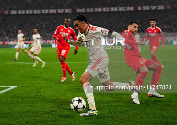 Jamal Musiala of Bayern Munich  controls the ball during the Champions League Round 4 match between Bayern Munich v Benfica at the Allianz a...