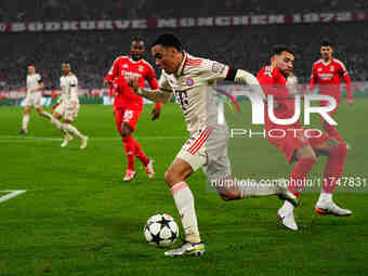 Jamal Musiala of Bayern Munich  controls the ball during the Champions League Round 4 match between Bayern Munich v Benfica at the Allianz a...