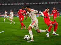 Jamal Musiala of Bayern Munich  controls the ball during the Champions League Round 4 match between Bayern Munich v Benfica at the Allianz a...