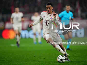 Jamal Musiala of Bayern Munich  controls the ball during the Champions League Round 4 match between Bayern Munich v Benfica at the Allianz a...