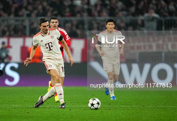 João Palhinha of Bayern Munich  controls the ball during the Champions League Round 4 match between Bayern Munich v Benfica at the Allianz a...