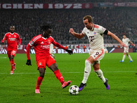 Harry Kane of Bayern Munich  controls the ball during the Champions League Round 4 match between Bayern Munich v Benfica at the Allianz aren...