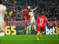 Konrad Laimer of Bayern Munich  heads during the Champions League Round 4 match between Bayern Munich v Benfica at the Allianz arena, Munich...