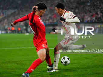 Jamal Musiala of Bayern Munich  controls the ball during the Champions League Round 4 match between Bayern Munich v Benfica at the Allianz a...