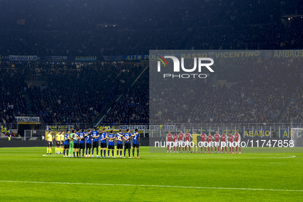 Silence for the victims in Valencia during the UEFA Champions League 2024/25 match between FC Internazionale and FC Arsenal at Stadio Giusep...