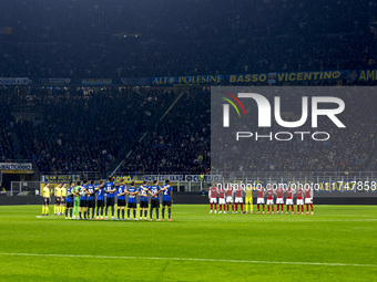 Silence for the victims in Valencia during the UEFA Champions League 2024/25 match between FC Internazionale and FC Arsenal at Stadio Giusep...