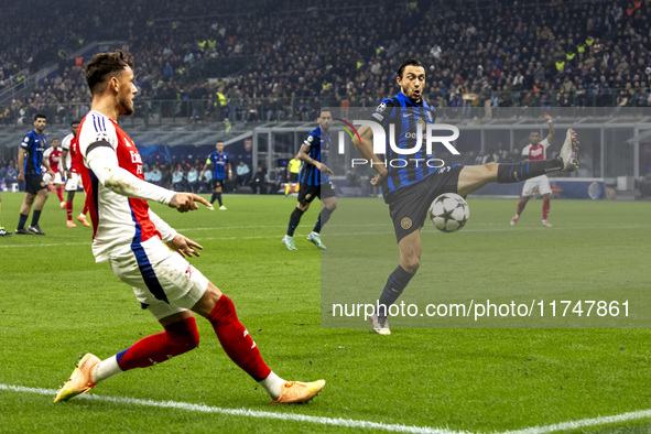 Matteo Darmian plays during the UEFA Champions League 2024/25 match between FC Internazionale and FC Arsenal at Stadio Giuseppe Meazza in Mi...