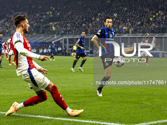 Matteo Darmian plays during the UEFA Champions League 2024/25 match between FC Internazionale and FC Arsenal at Stadio Giuseppe Meazza in Mi...