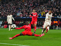 Serge Gnabry of Bayern Munich  controls the ball during the Champions League Round 4 match between Bayern Munich v Benfica at the Allianz ar...