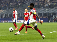 Bukayo Saka plays during the UEFA Champions League 2024/25 match between FC Internazionale and FC Arsenal at Stadio Giuseppe Meazza in Milan...