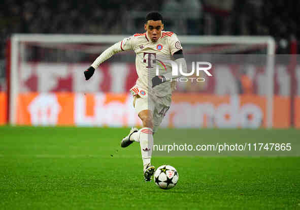 Jamal Musiala of Bayern Munich  controls the ball during the Champions League Round 4 match between Bayern Munich v Benfica at the Allianz a...