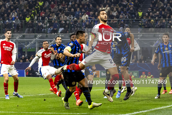 Mikel Merino plays during the UEFA Champions League 2024/25 match between FC Internazionale and FC Arsenal at Stadio Giuseppe Meazza in Mila...