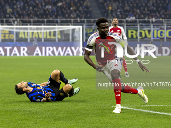 Bukayo Saka plays during the UEFA Champions League 2024/25 match between FC Internazionale and FC Arsenal at Stadio Giuseppe Meazza in Milan...