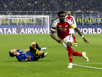 Bukayo Saka plays during the UEFA Champions League 2024/25 match between FC Internazionale and FC Arsenal at Stadio Giuseppe Meazza in Milan...