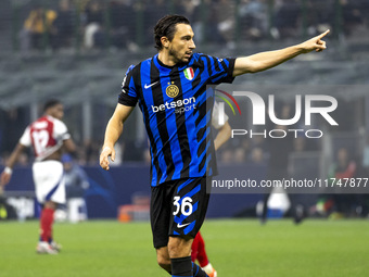 Matteo Darmian plays during the UEFA Champions League 2024/25 match between FC Internazionale and FC Arsenal at Stadio Giuseppe Meazza in Mi...