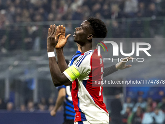 Bukayo Saka plays during the UEFA Champions League 2024/25 match between FC Internazionale and FC Arsenal at Stadio Giuseppe Meazza in Milan...