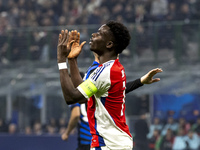 Bukayo Saka plays during the UEFA Champions League 2024/25 match between FC Internazionale and FC Arsenal at Stadio Giuseppe Meazza in Milan...